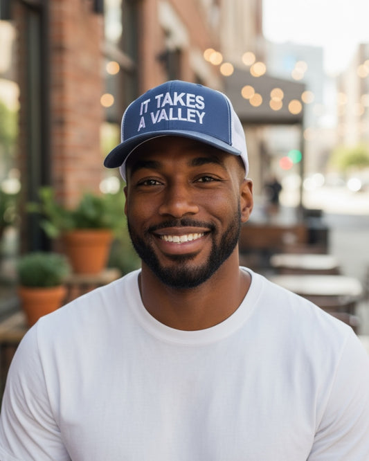 It Takes a Valley blue and white trucker hat, front view